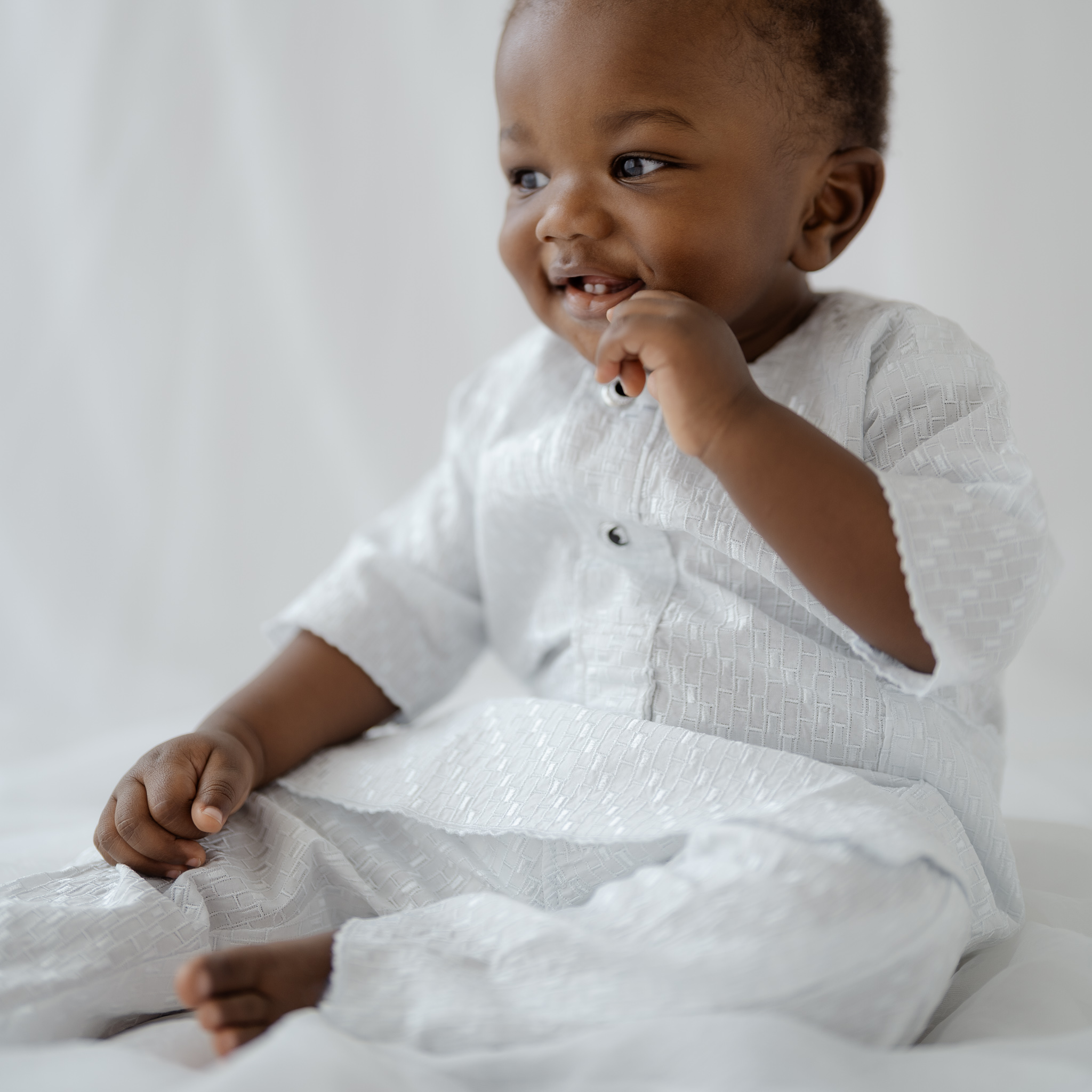 Candid one-year-old portrait from first birthday milestone session in Fort Worth.